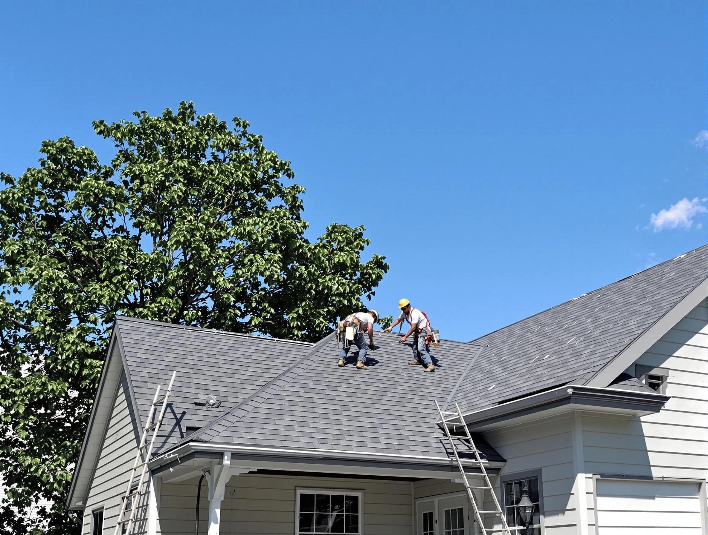 Fairview Park Roofing Company crew finalizing a roof installation in Fairview Park, OH