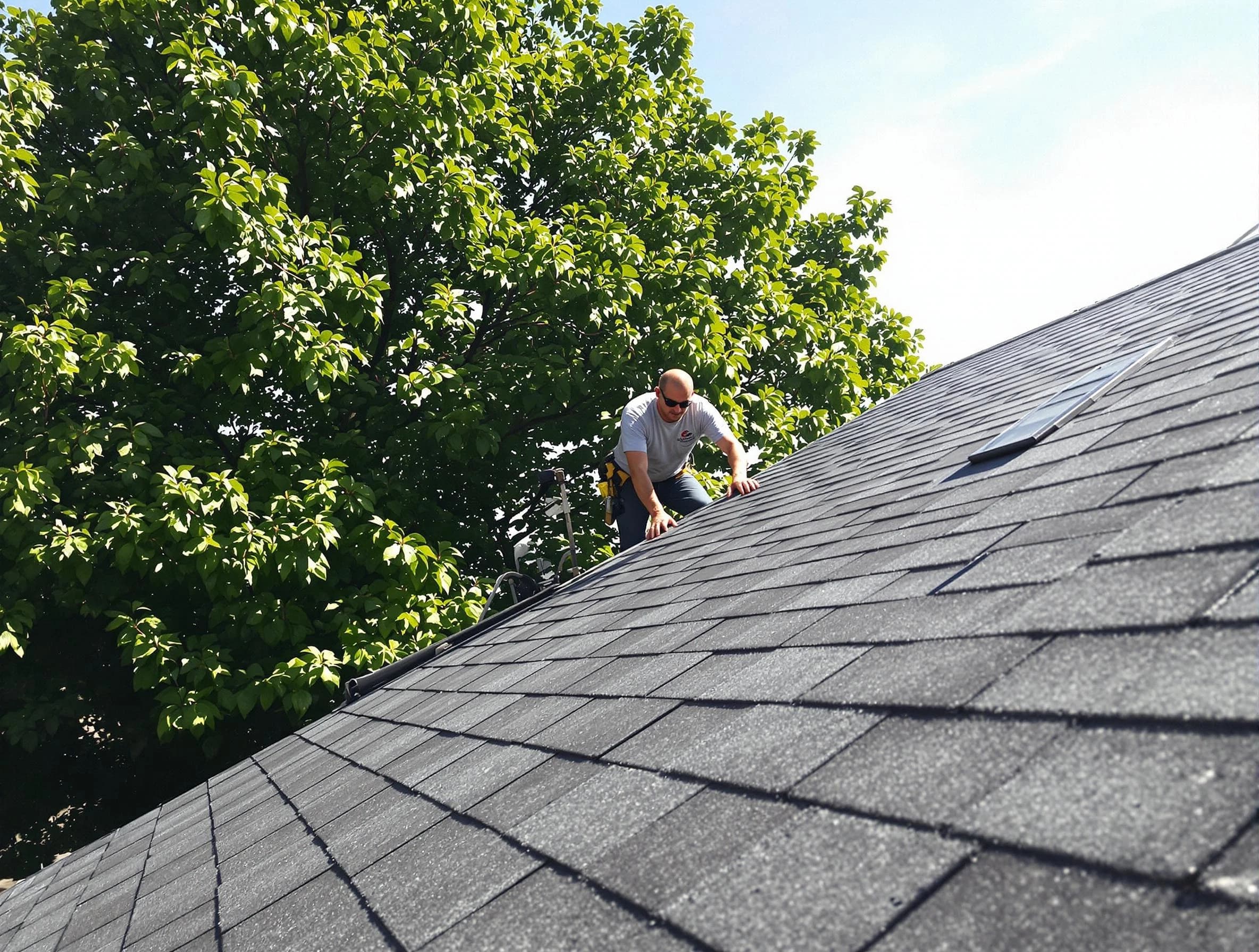 Certified roofers from Fairview Park Roofing Company working in Fairview Park, OH